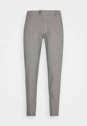 Grå rutete bukser med slim fit, med knappelukking og strømlinjeformet design. Materialet har en jevn tekstur med synlig rute-mønster.