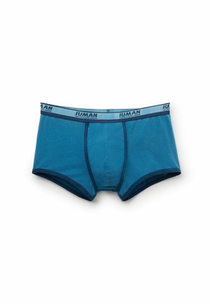 Boxer in cotone teal da uomo con un cinturino blu a contrasto, dotati di una tasca frontale e design liscio e senza cuciture.