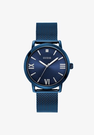 Sinine metallkell, millel on võrgubänd, ümmargune korpus, tumehall kellaplaat, hõbedased rooma numbrid ning elegantne hõbedane tunni- ja minutisse käsi.