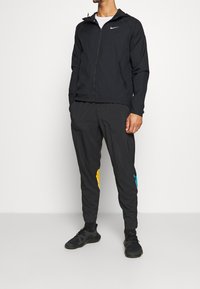 Nike Performance Giacca da running - black
