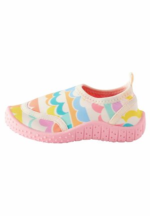 Zapato infantil sin cordones con suela texturizada rosa y patrón multicolor de ondas en la parte superior de tela.