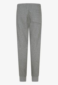 Hallid dressipüksid, millel on sile tekstuur, taga tasku ja soonilised mansetid pahkluudes. Vöökoht on elastne mugavuse tagamiseks.