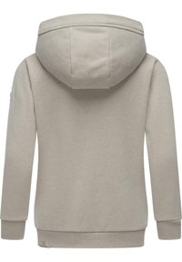 Felpa con cappuccio in beige chiaro, con una texture liscia, polsini e orlo a costine, e un'etichetta logo discreta sul lato inferiore.