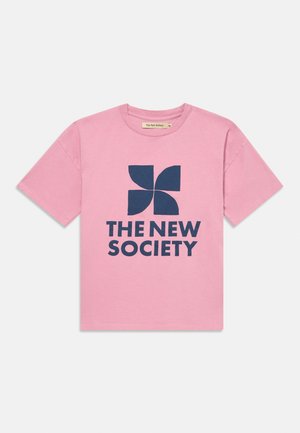 Pink short-sleeve T-shirt with navy blue four-petal flower graphic and text "THE NEW SOCIETY" on front.