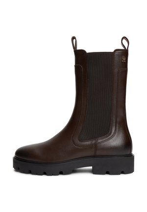 Dark brown leather Chelsea boot with black elastic side panels, pull tabs on top, and chunky black rubber sole.