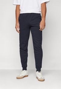 KARL LAGERFELD - PANTS - Tracksuit bottoms - navy Thumbnail Image 1