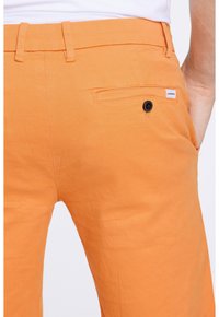 Lindbergh SUPERFLEX - Shorts - burnt orange