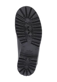 Semelle de chaussure en caoutchouc noir dotée d'une surface texturée avec des profondes rainures et des motifs croisés, étiquetée avec la taille et le texte "Fabriqué en Pologne".