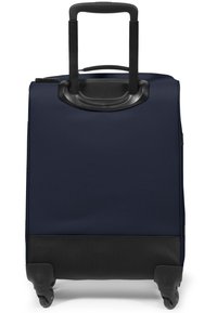 Laavansin tummansininen laukkupyörä, jossa on kova musta pohja, varustettuna veto-otolla ja sileällä, kestävä ulkopinnalla.