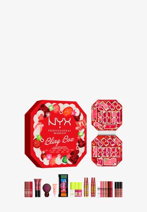 NYX Professional Makeup Bling Box avec calendrier de l'Avent 24 jours et différents rouges à lèvres, fards à paupières, gloss et produits de maquillage présentés.