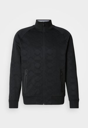Black zip-up jacket with a high collar. The fabric features a textured pattern and includes two zippered side pockets.