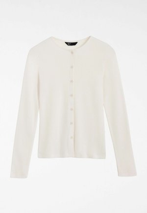 Cardigan crem cu mâneci lungi, din țesătură cu nervuri, având un decolteu rotund și o rând de șase nasturi pe partea din față. Textură moale.