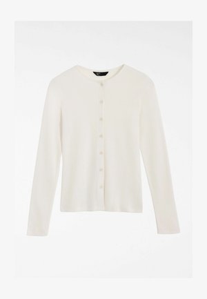 Cardigan crem cu mâneci lungi, din țesătură cu nervuri, având un decolteu rotund și o rând de șase nasturi pe partea din față. Textură moale.