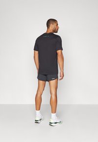 Nike Performance KIPCHOGE - Športové šortky - black/stadium green