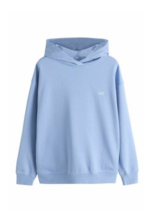 Hellblauer Kapuzenpullover mit langen Ärmeln und kleinem weißem "self."-Schriftzug auf der linken Brust, keine sichtbaren Verschlüsse oder Taschen.