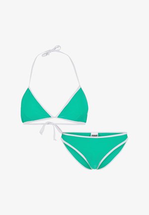 Türkiz bikiniszett, trópusi minitop fehér díszítéssel és megkötős hátkivágással, párosítva a hozzá illő hipster alsóval, fehér részletekkel.