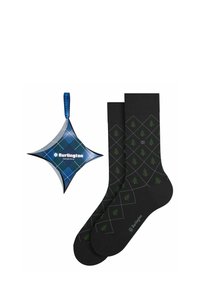 Czarne skarpetki z wzorem diamentowym przedstawiającym zielone drzewa; zapakowane w niebieską, gwiazdkowatą metkę z logo Burlington.