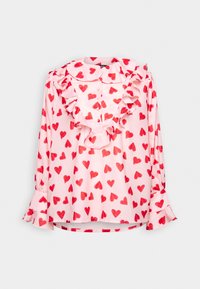 Blouse rose à manches longues avec motif de cœurs rouges, col à volants et panneau avant, poignets boutonnés et boutons sur le devant.