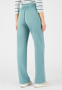Damart JAMBES LARGES - Pantalones - vert grisé