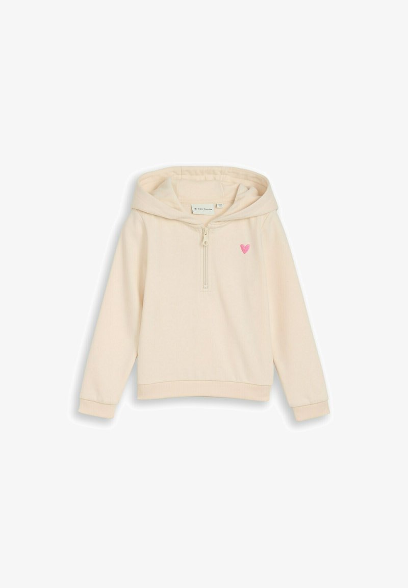 Sweat à capuche pour enfants de couleur crème, manches longues, fermeture à glissière moitié avant, capuche, avec un petit cœur rose sur le côté gauche de la poitrine.