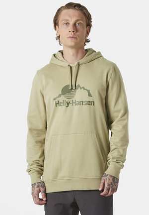 Khaki hoodie met een voorzak, capuchon met koord en groene grafische print van bergen en het merk "Helly-Hansen." Zachte stoftextuur.