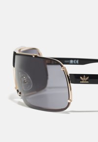 adidas Originals UNISEX - Óculos de sol - shiny rose gold-coloured/smoke