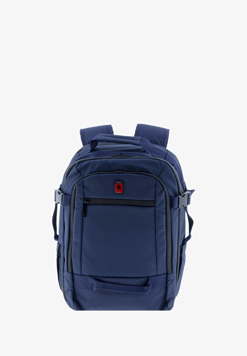 Zaino blu navy realizzato in tessuto resistente, dotato di più scomparti con zip, spallacci imbottiti e manico superiore.