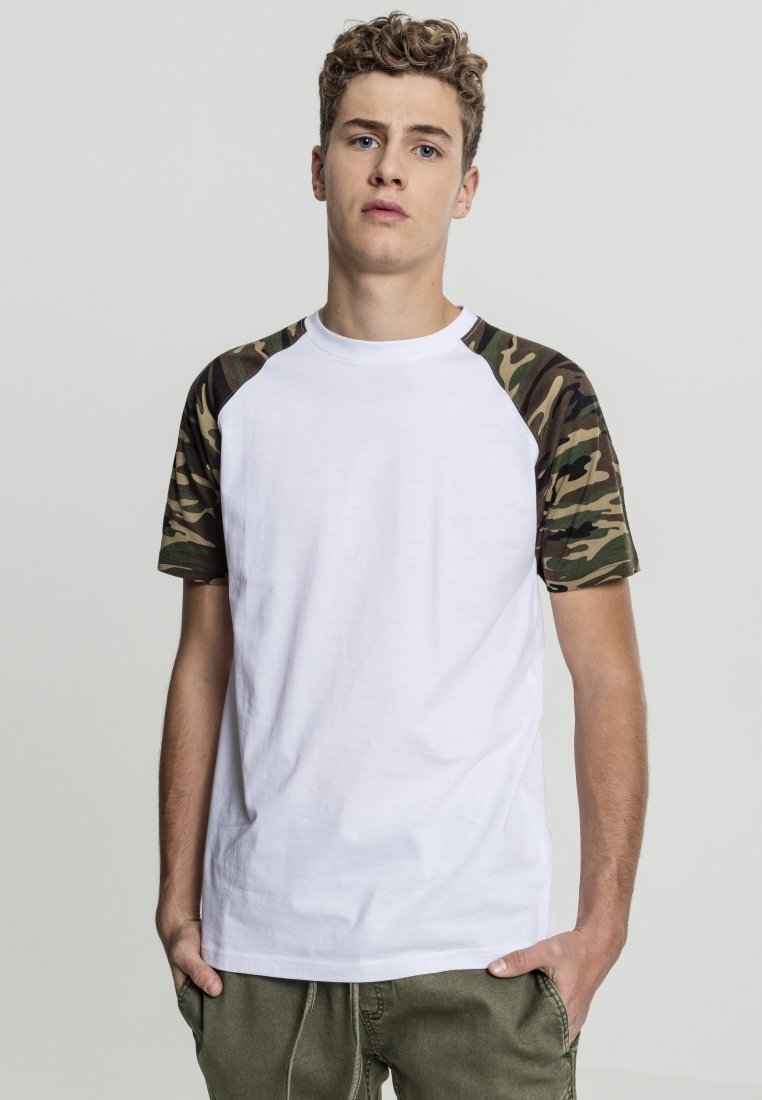 White cotton T-shirt with camouflage print short sleeves, round neck, and a relaxed fit. Features raglan sleeve design and smooth texture.