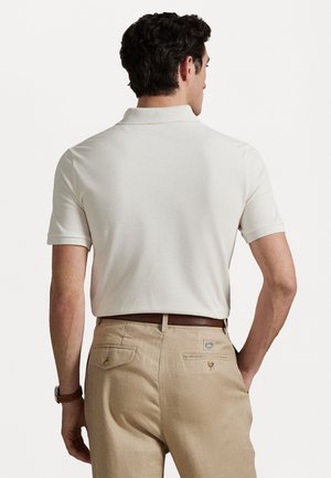 - Koszulka polo