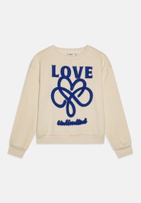 Krémová mikina s výrazným modrým vyšitým nápisom "LOVE" a dizajnom srdca, s "Unlimited" pod ním. Rífsové manžety a lem.