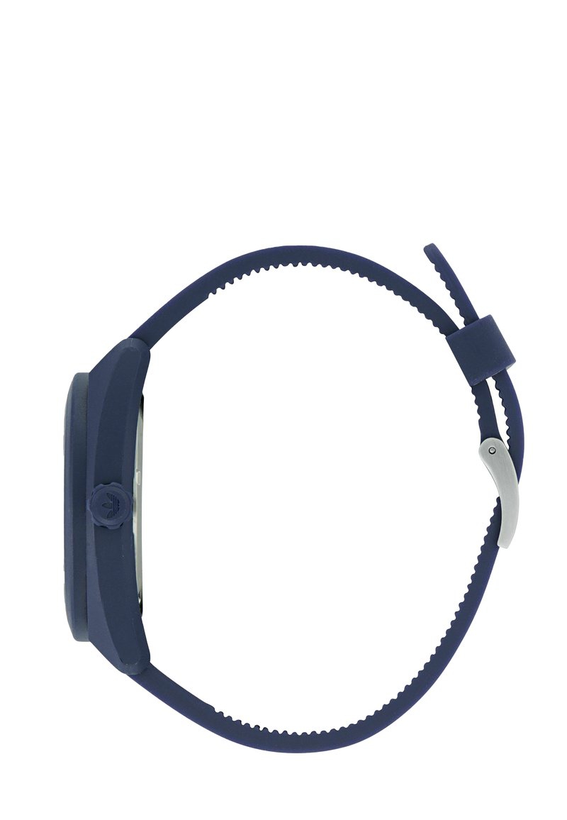 Navy blue wristwatch with a silicone strap, side-facing round case, and metal buckle clasp on a white background.