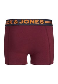 Bordeauxkleurige boxershorts met een zwarte tailleband waarop "Jack & Jones" in oranje letters staat. Glad materiaal en aansluitend ontwerp.