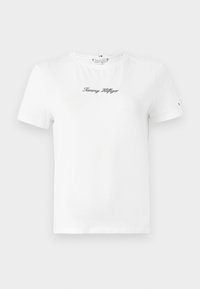 T-shirt en coton blanc avec des manches courtes et un décolleté rond. Logo brodé noir "Tommy Hilfiger" centré sur la poitrine.