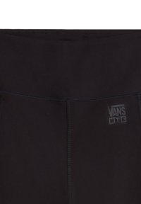 Svarta leggings med elastisk midja, med sydda detaljer och en liten Vans MTE-logotyp i vitt. Slät tygtextur.