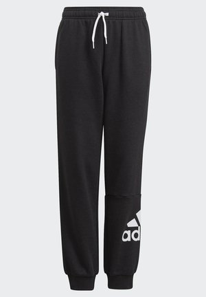 Pantalons de survêtement noirs avec taille élastique et cordon de serrage, ourlets aux chevilles et logo Adidas blanc sur la jambe gauche. Fabriqués en tissu doux et texturé.