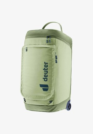 Zaino con rotelle in tessuto verde chiaro, dotato di una tasca anteriore con cerniera, logo blu e maniglia superiore per un facile sollevamento. Ruote durevoli nella parte inferiore.