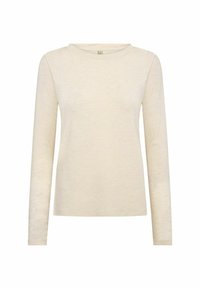 Helebeige pikadee särg pikkade varrukatega pehmest, tekstuuriga kangast. Omab ümarat kaelust ja lõdva istuvust, sobib igapäevaseks kandmiseks.