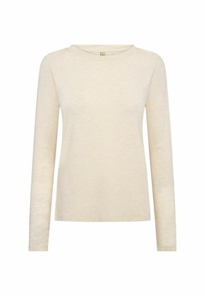 Jasnobeżowa, długorękawowa koszulka w miękkim, teksturowanym materiale. Posiada okrągły dekolt i luźny krój, idealna do noszenia na co dzień.