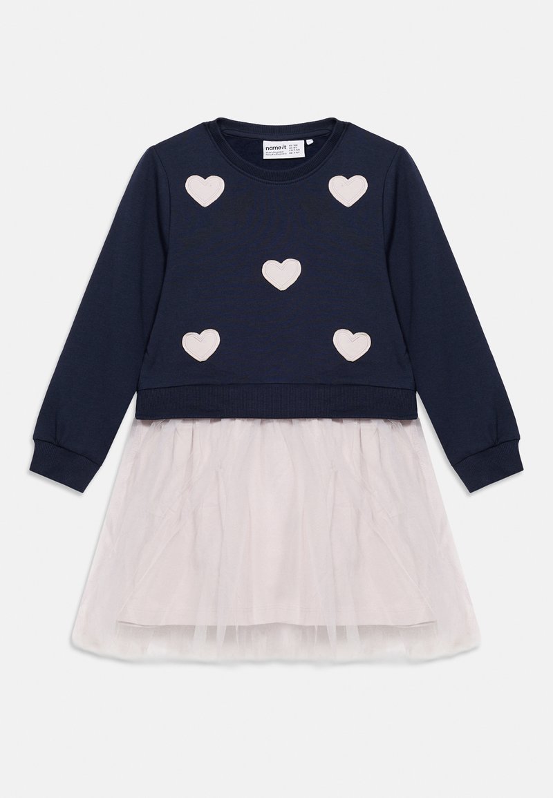 Φόρεμα μακρυμάνικο σε ναυτικό μπλε χρώμα με πέντε ανοιχτόχρωμες ροζ καρδιές στο μπούστο και φούστα από απαλό ροζ τούλι.