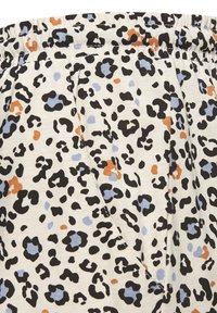 Leopard-print fabric in cream, featuring black, blue, and orange spots. Elastic waistband and textured surface detail.