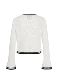 White knit sweater with a textured pattern, cropped design, and black stripe accents at the cuffs and hem. Long sleeves with bell-shaped cuffs.