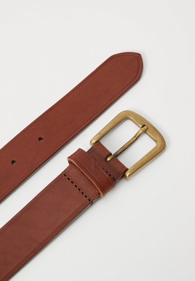 Brown leather belt with a textured surface, featuring a rectangular brass buckle and multiple adjustment holes along the strap.