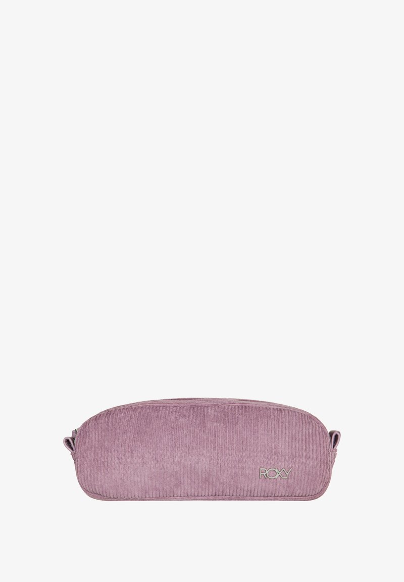 Vaalea vaaleanpunainen corduroypensselitapaus, jossa on pyöristetty muoto ja vetoketjukiinnitys. Etupuolella hopeinen Roxy-logo. Pehmeä rakenne, kompakti muotoilu.