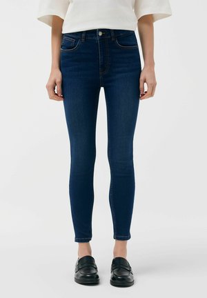 - Jeansy Skinny Fit