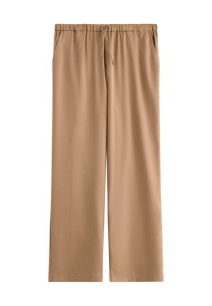 Beige viddebukser med elastik i taljen og snøre, med sidelommer, vist fladt på hvid baggrund.