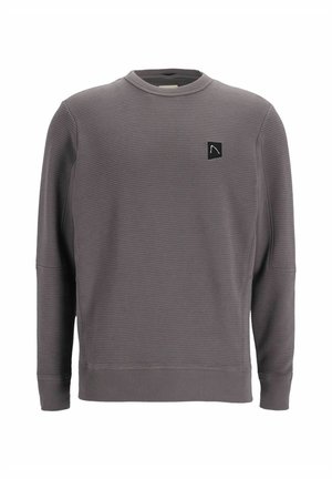 Pilkas švelnus ilgomis rankovėmis džemperis su apvali kaklo iškirpte ir mažuoju juodu simboliu kairėje krūtinės pusėje.