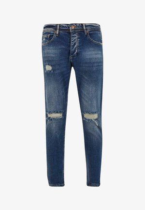 Jeans din denim albastru cu o croială slim, prezentând zone distresate, margini desfăcute și pete mai deschise. Design clasic cu cinci buzunare și închidere cu buton.