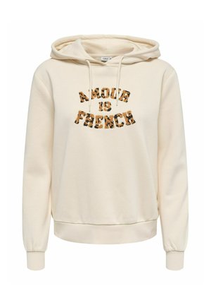 Sweat à capuche couleur crème avec texte imprimé léopard « "AMOUR IS FRENCH" » sur le devant et cordons à la capuche.