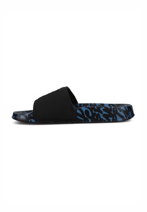 Black slide sandal with a wide strap and a blue patterned sole featuring abstract black designs. Made of synthetic material, durable and lightweight.