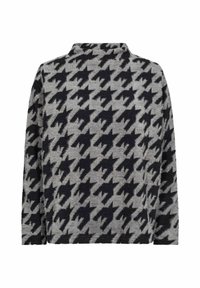 Hallhallane sakko, millel on must houndstooth mustriga, pehme ja tekstuurne kangas ning kraega kaelus. Pikkade varrukatega, lõdva istuvusega.